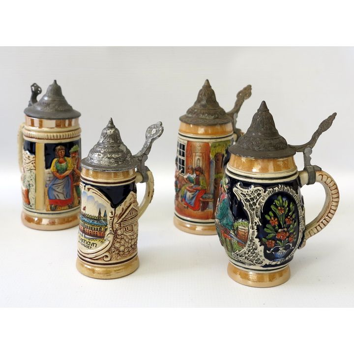 COLLECTION OF 4 GERMAN STEINS