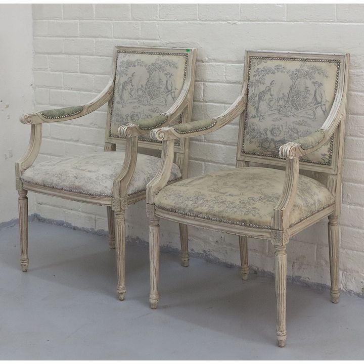 PAIR OF UPHOLSTERED OPEN ARMCHAIRS