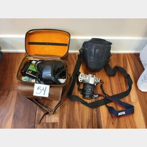 Vintage Minulta Camera and Digital Canon Camera