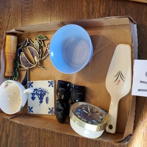 Vintage alarm clock, blue glass bowl, pie server