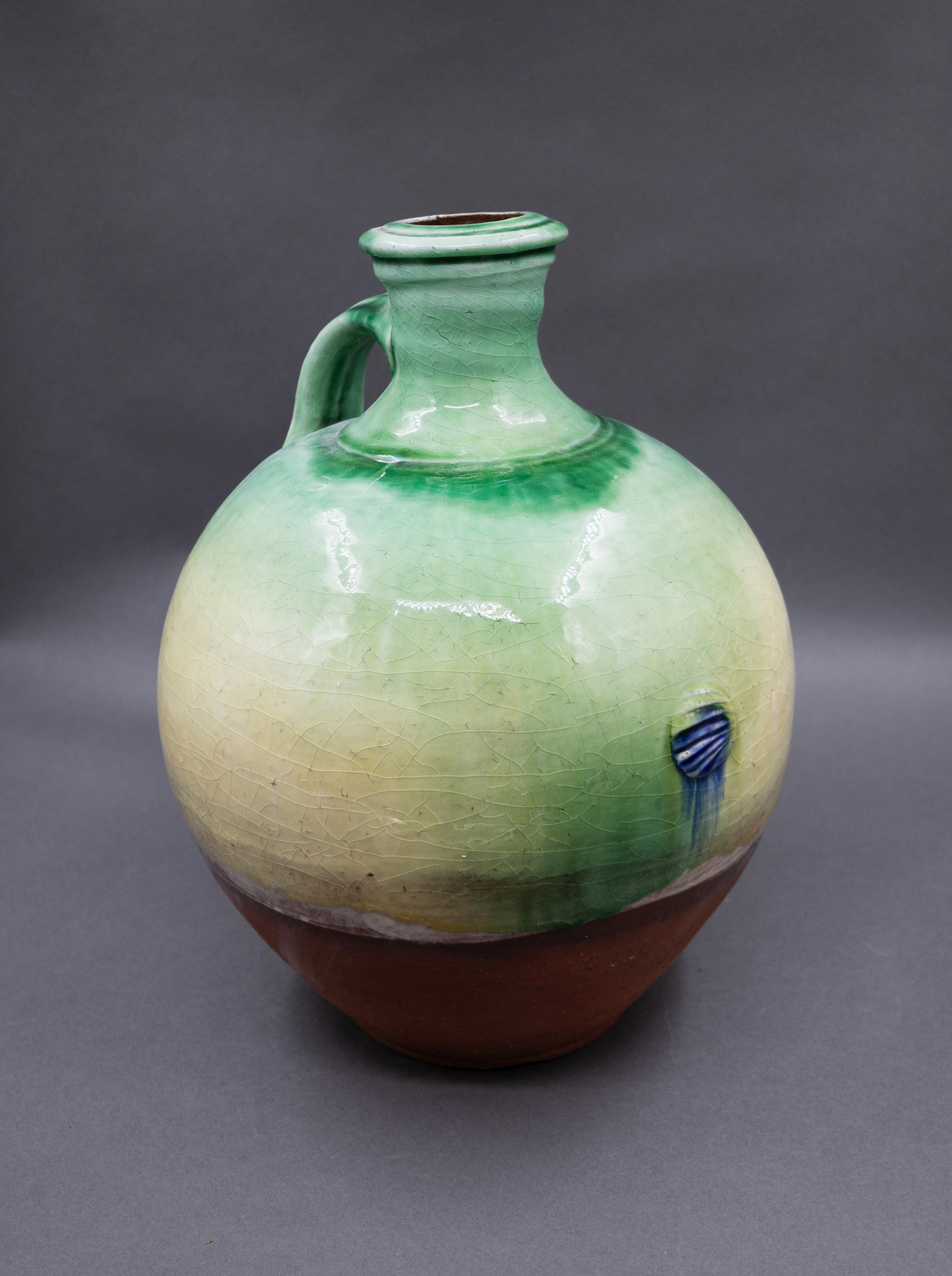 Andrew van der Putten - Large green and yellow flagon — sold at auction in New Zealand for $225