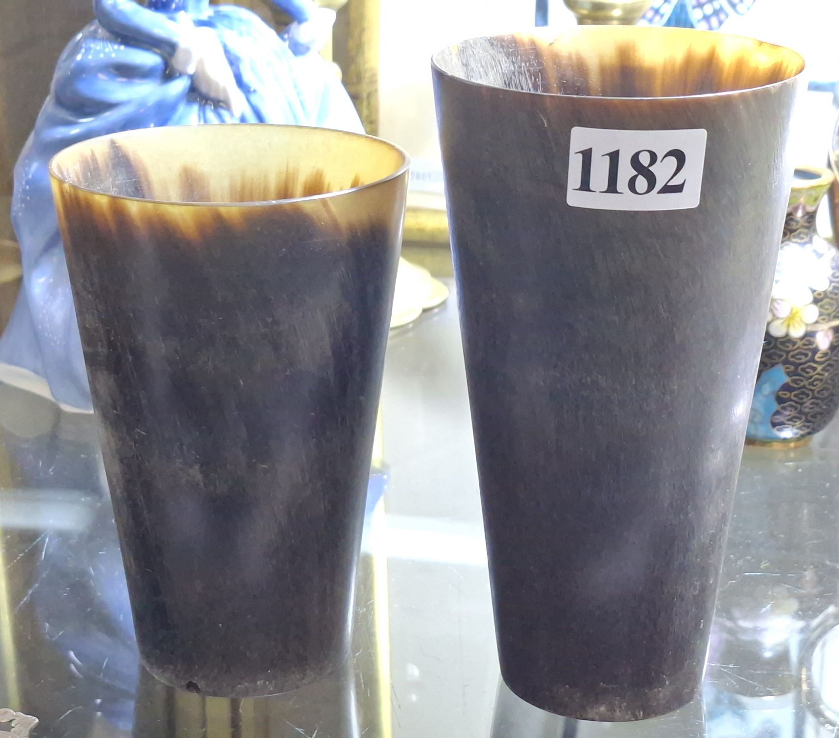 1182 · TWO ANTIQUE HORN BEAKERS