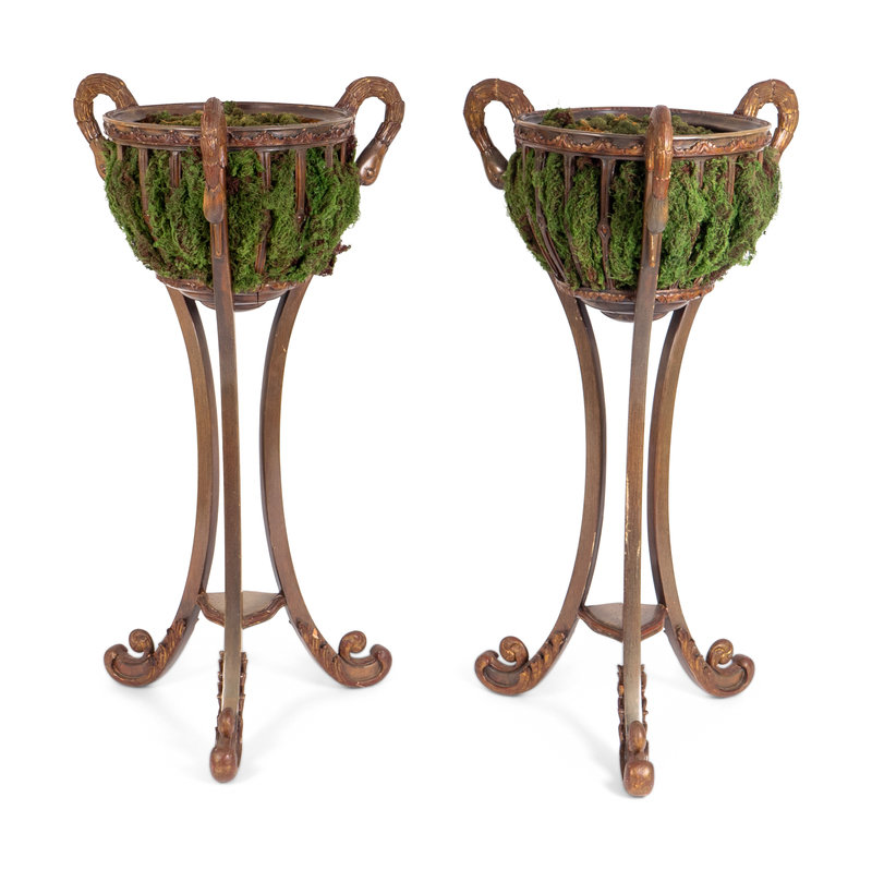 A Pair of Neoclassical Style Composition Jardinières
Height 48 x diameter of bowl 18 inches.