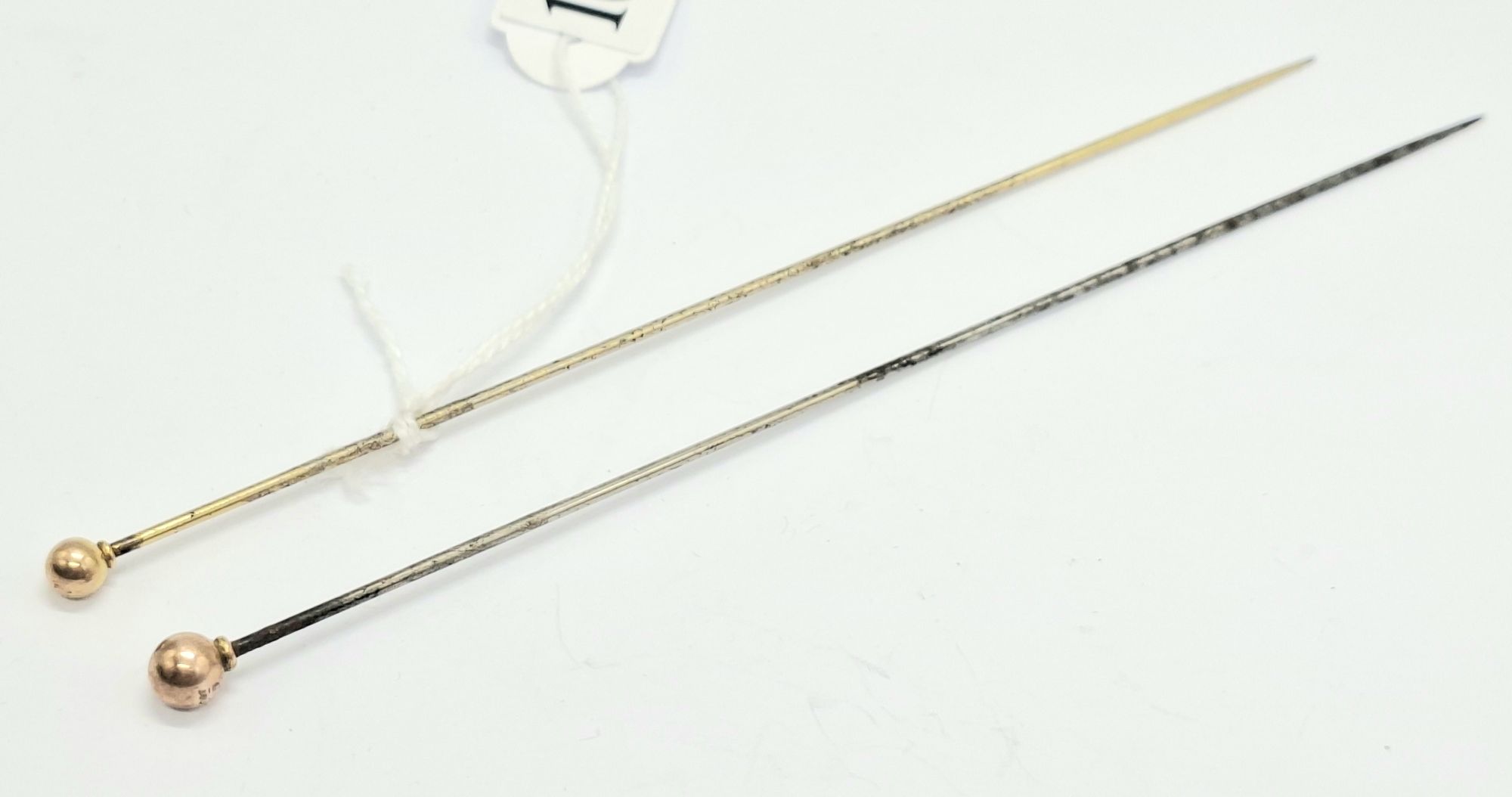 Two 9ct Ball Hat Pins
