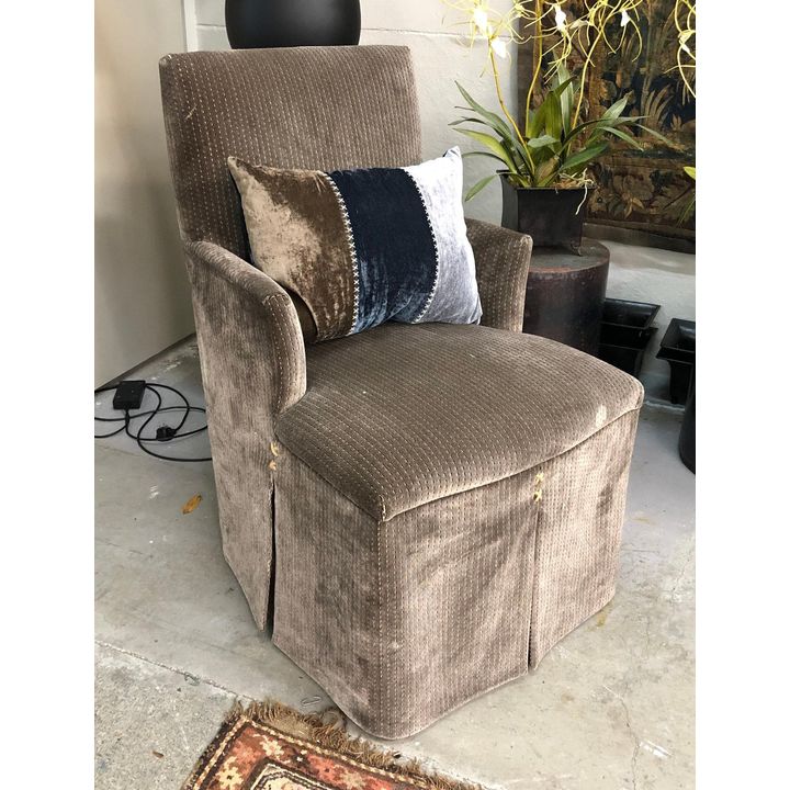 A slipper armchair