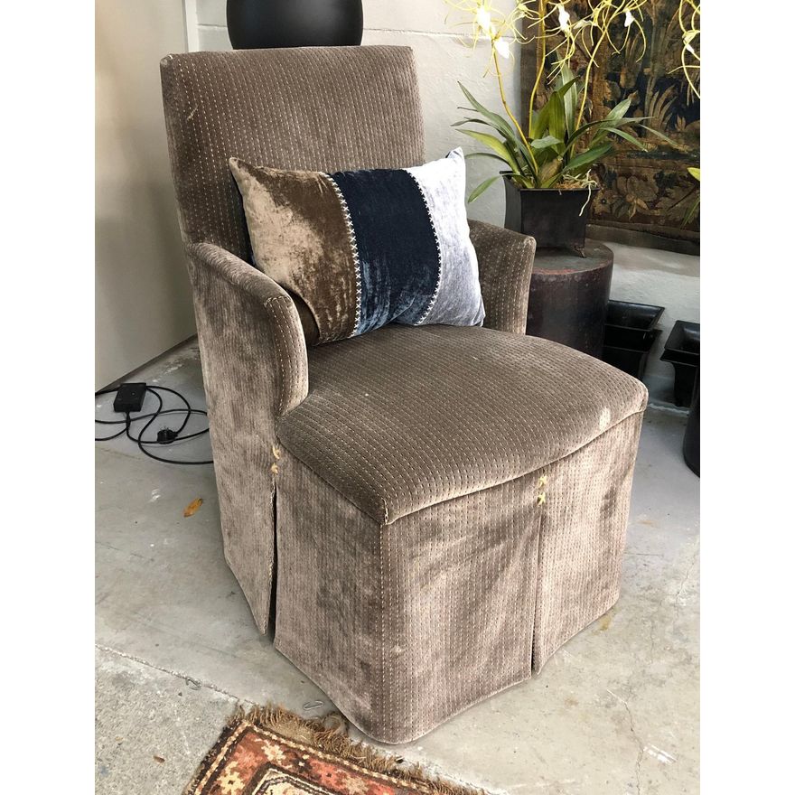 A slipper armchair
