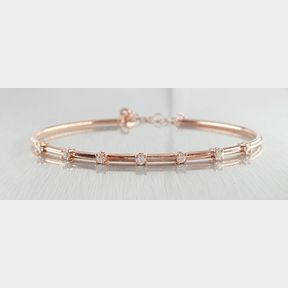 18CT ROSE GOLD BANGLE WITH 7 DIAMONDS TOTAL 0.210CT COLOUR IJ CLARUTY VS/SI - 51929/3535