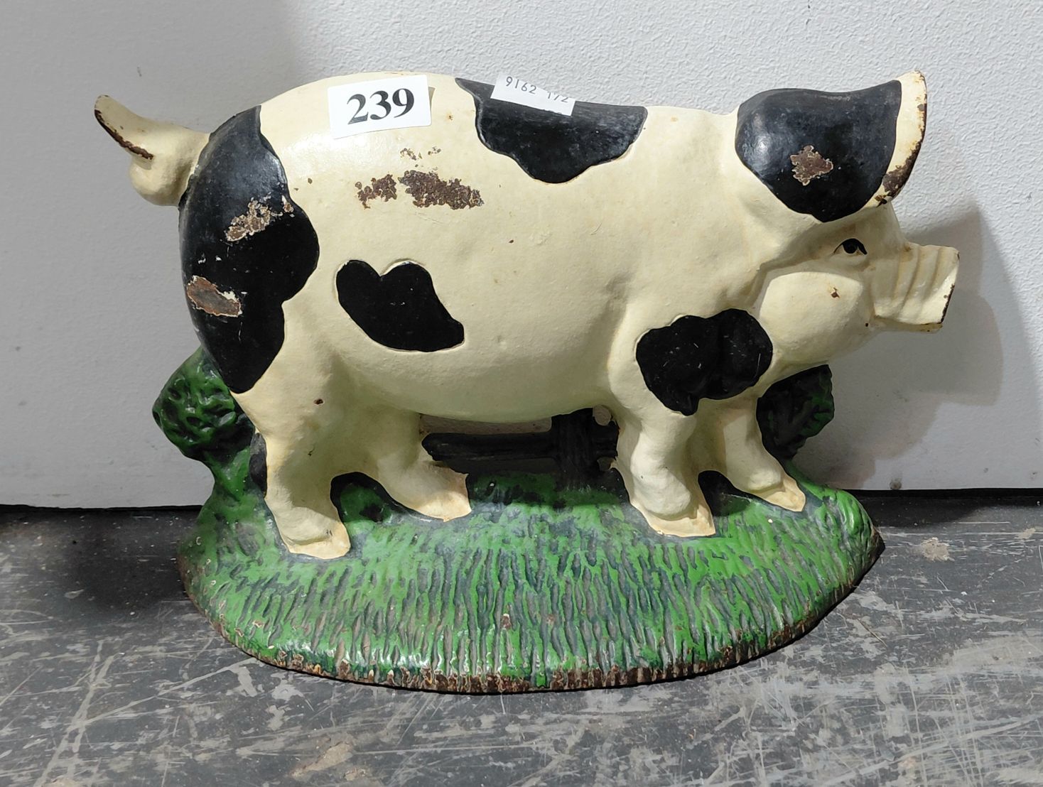 239 · BLACK AND WHITE PIG DOORSTOP