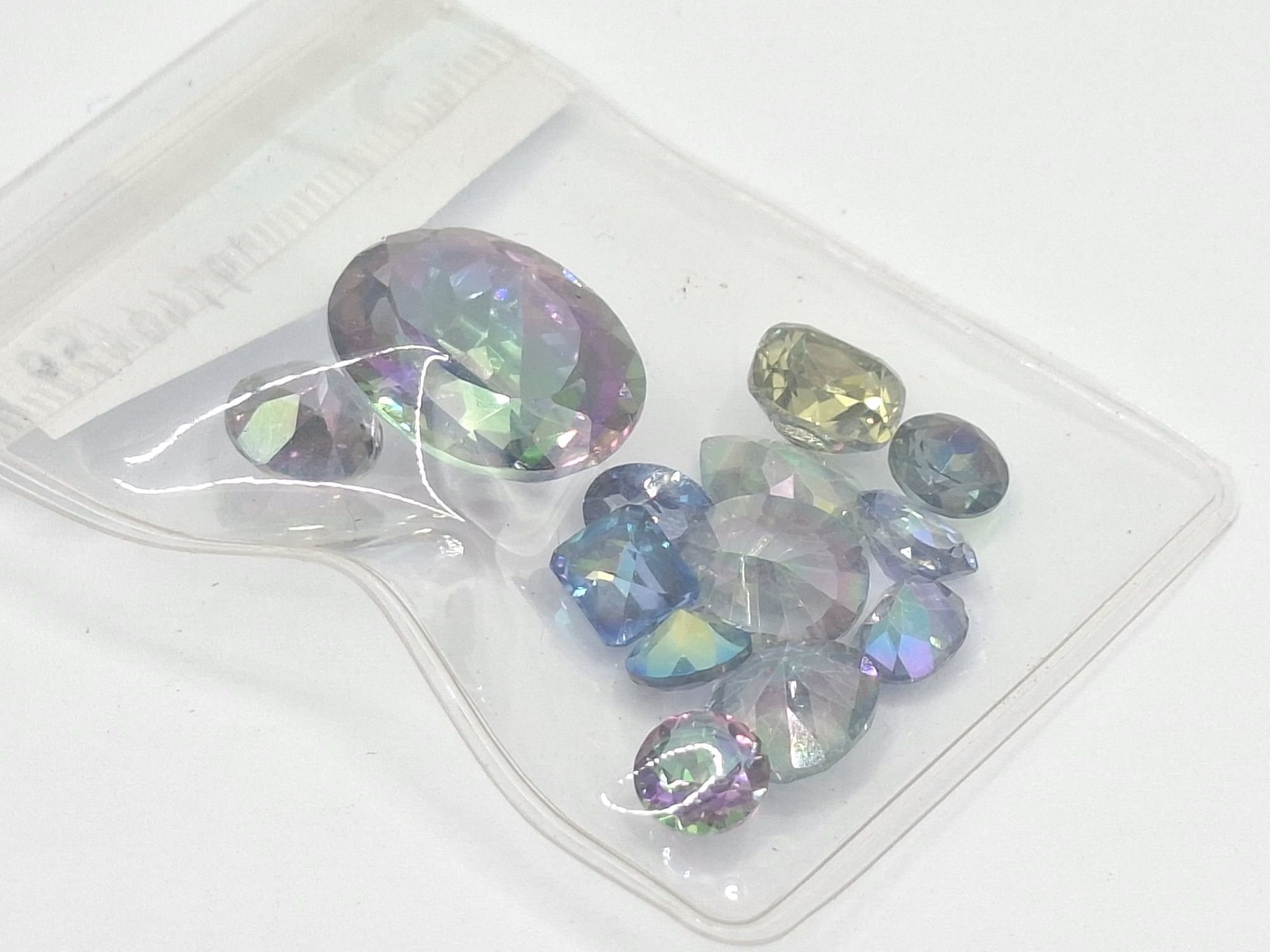 57 · MYSTIC TOPAZ GEMSTONES