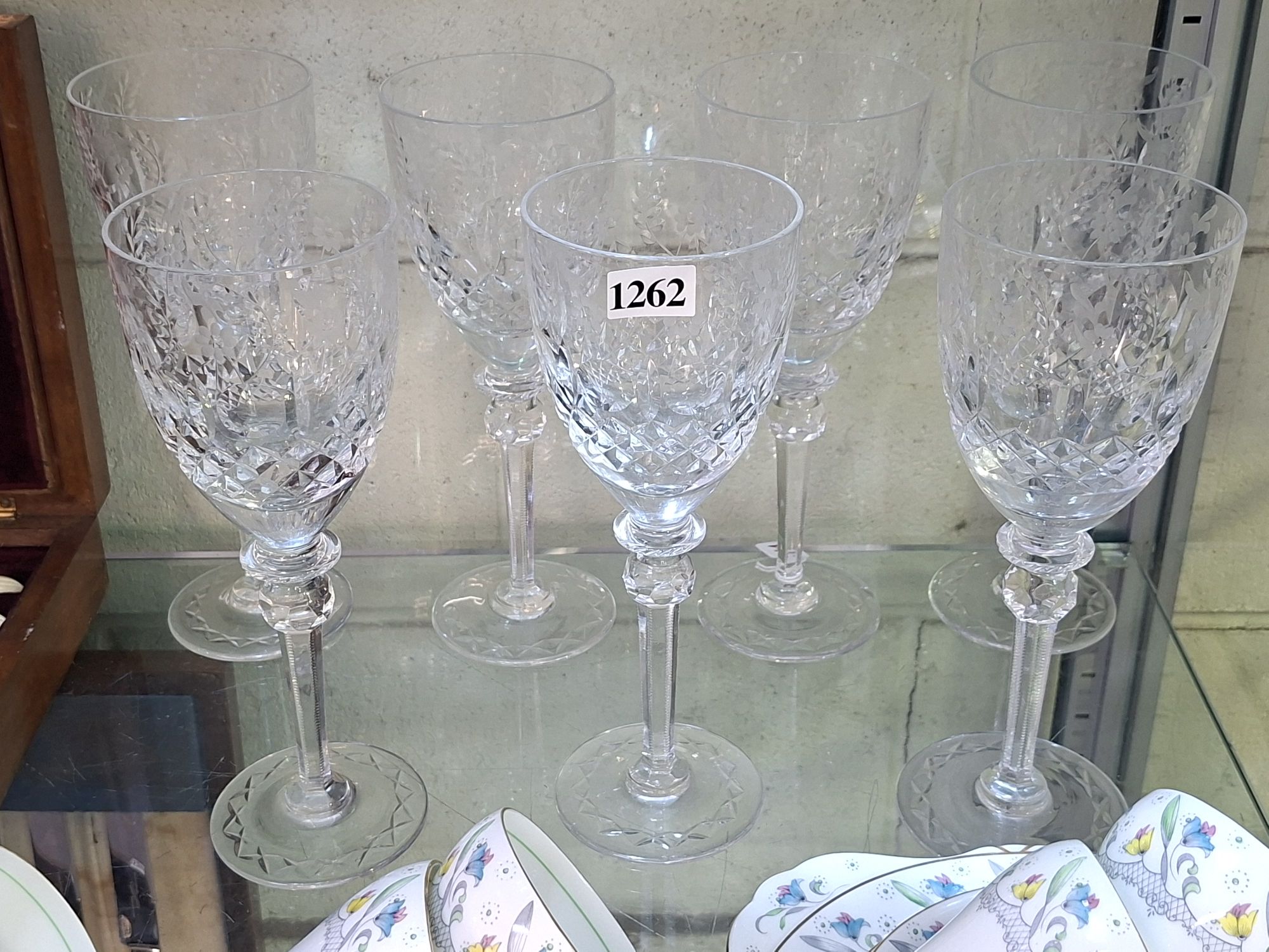 A Suite Of Cut Crystal Wine Glasses