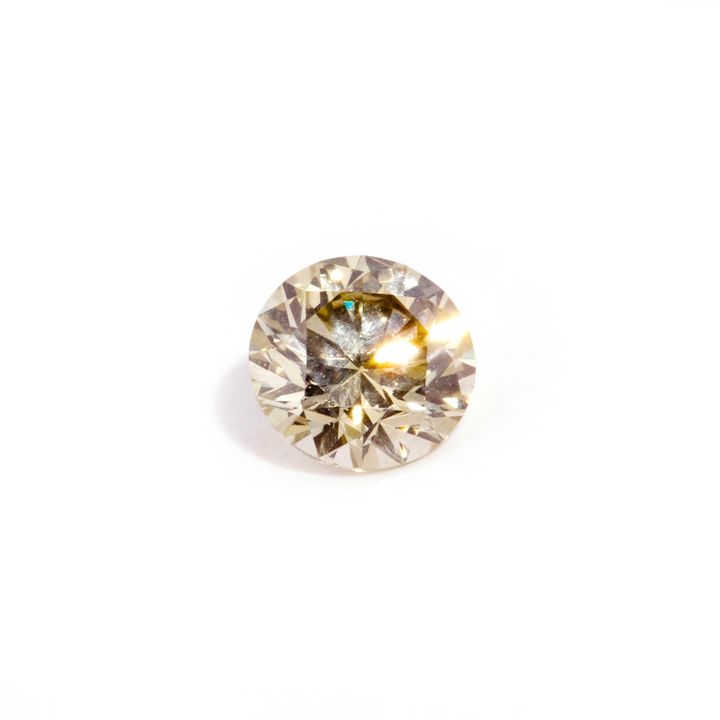 0.29 Carat Natural Fancy Yellowish Green Round Diamond,