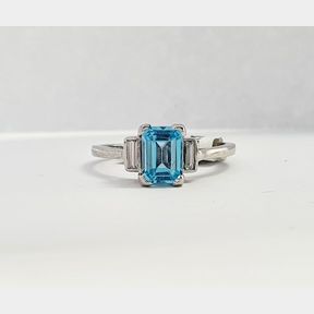 18CT WHITE GOLD RING WITH 1.1800CTS NATURAL TOPAZ + .250CTS BUGGEUTTE CUT DIAMONDS COLOUR I/J CLARITY VS/SI - 2.96G - 51624/07