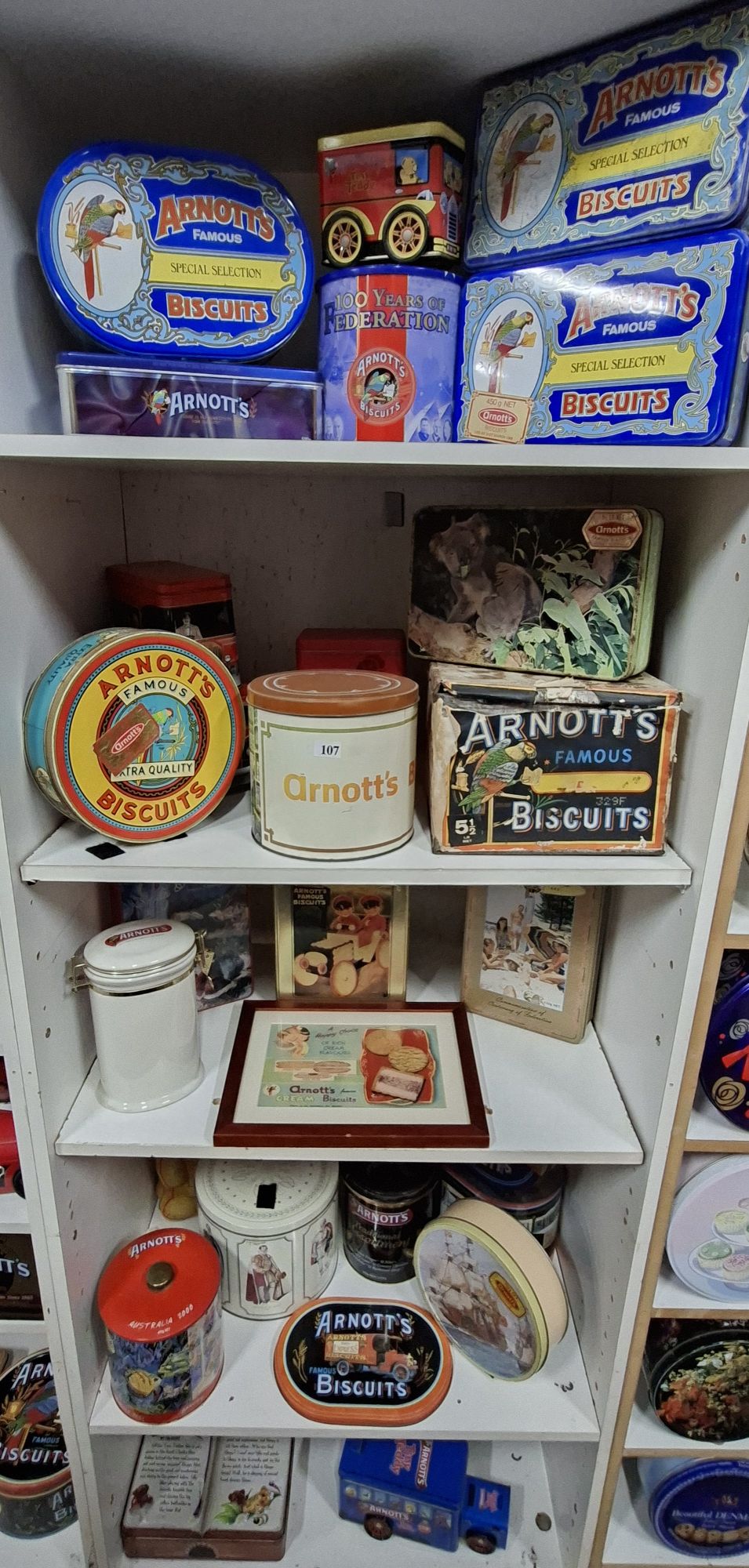 107 · LARGE QUANTITY OF TINS