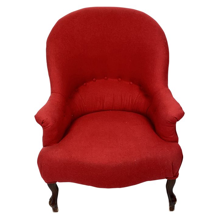 An early 20th century French mahogany red wool upholstered armchair