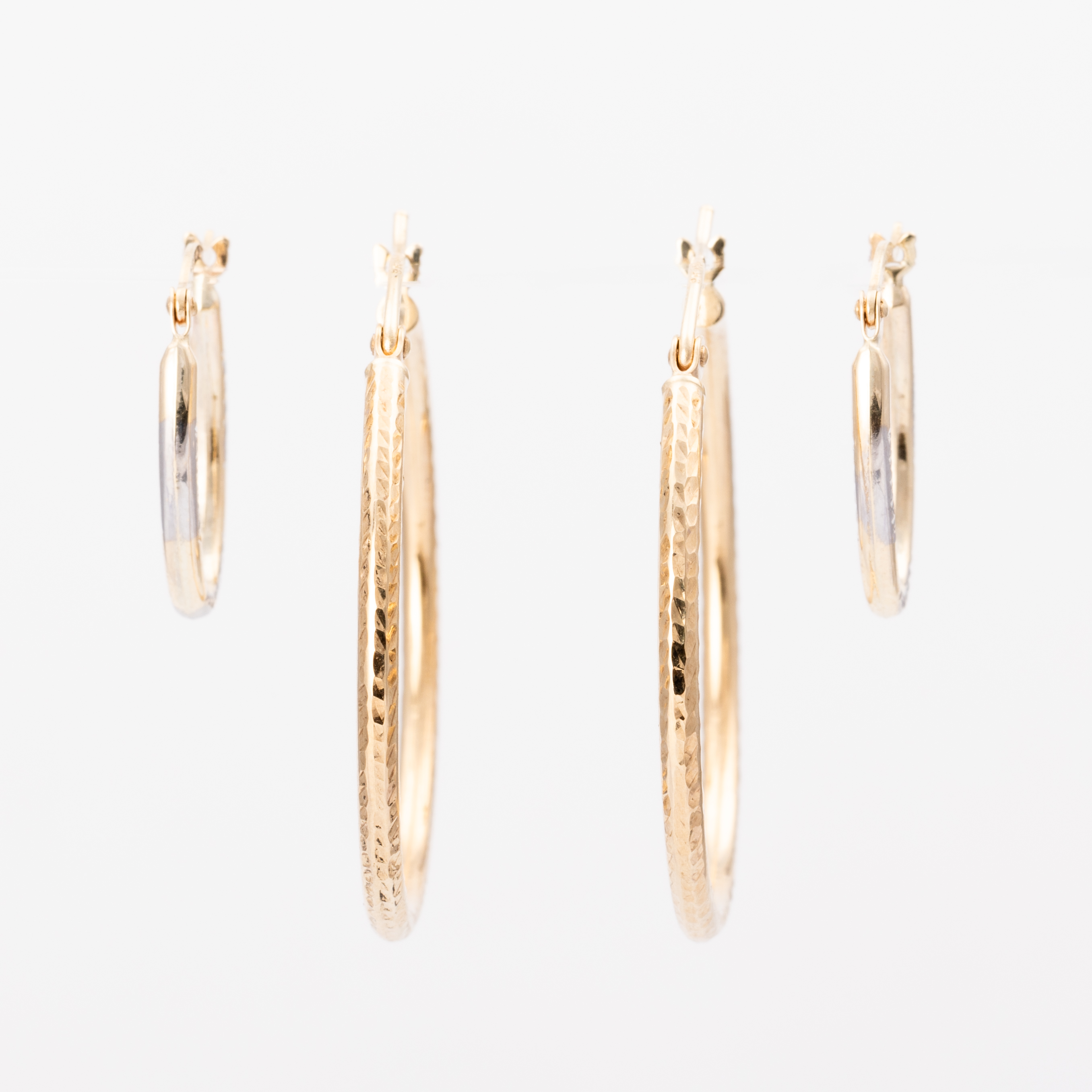 268 · Two Pairs of Hoop  9ct Gold Earrings