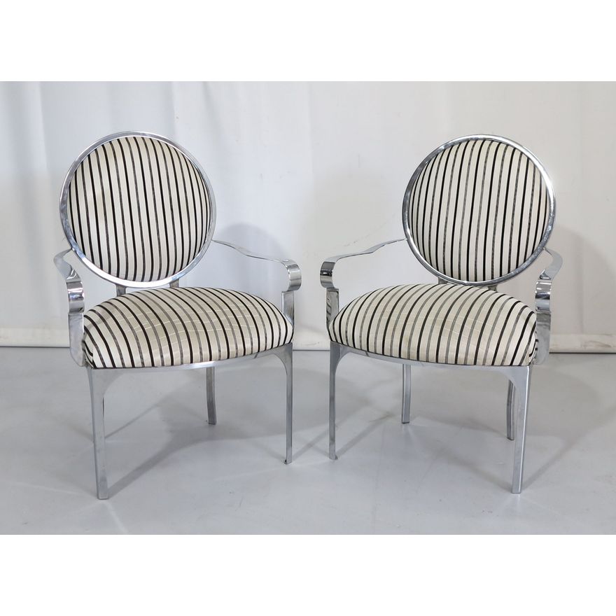 PAIR OF UPHOLSTERED STAINLESS STEEL ARMCHAIRS
