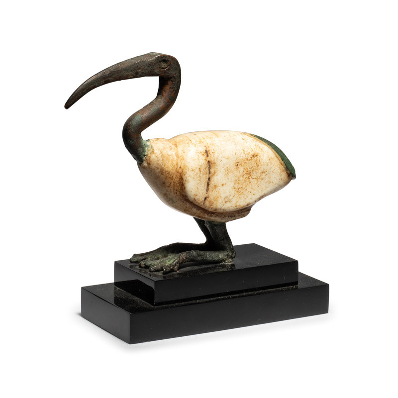 An Egyptian Bronze and Alabaster Ibis
Length 4 inches (10.4 cm).