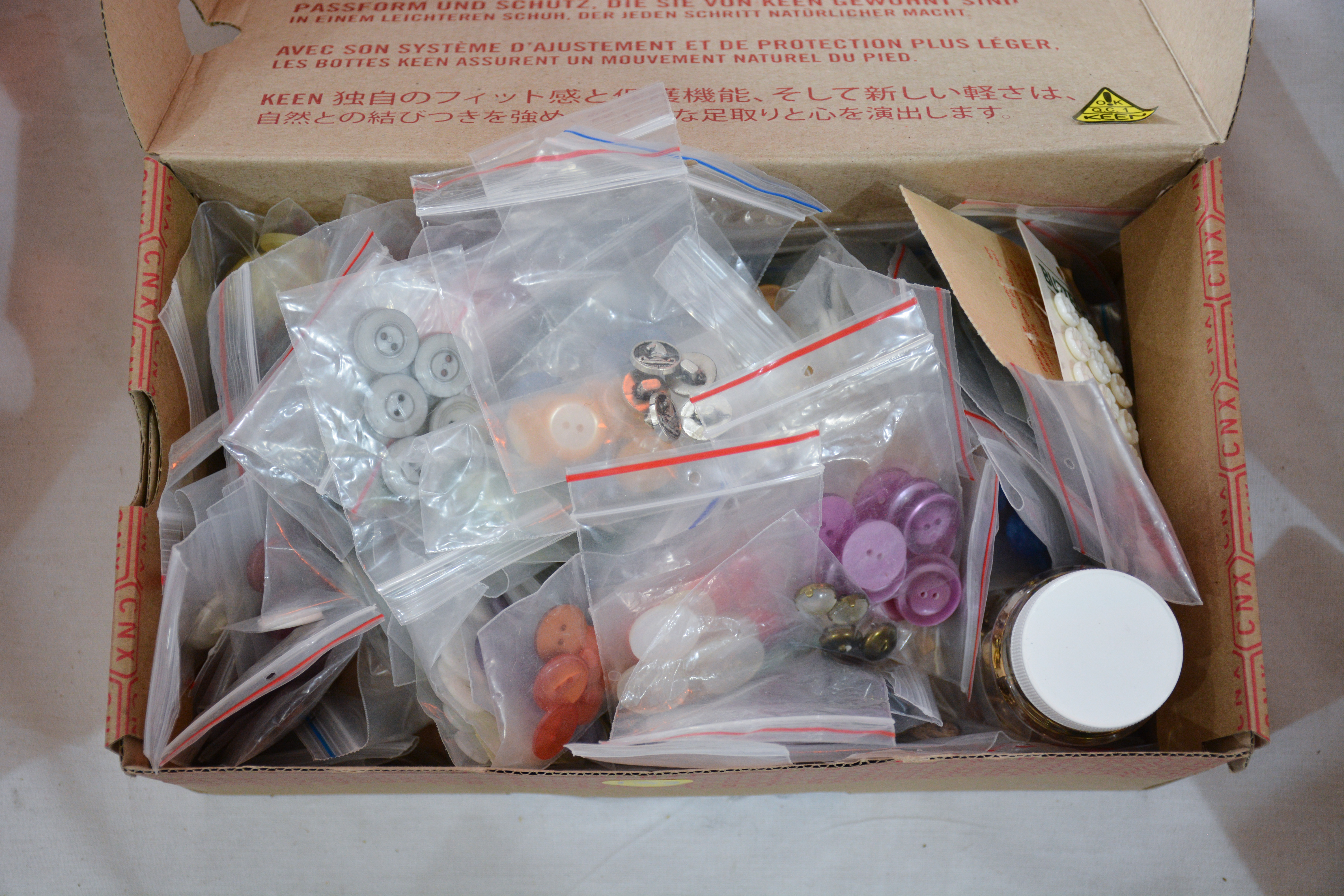 Large Collection of Assorted Buttons — sold at auction in New Zealand for $25