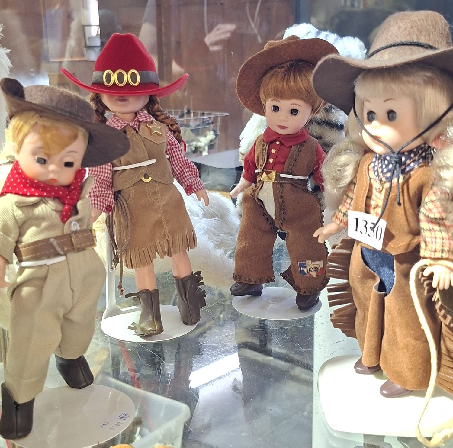 1350 · FOUR WESTERN THEMED COLLECTORS DOLLS