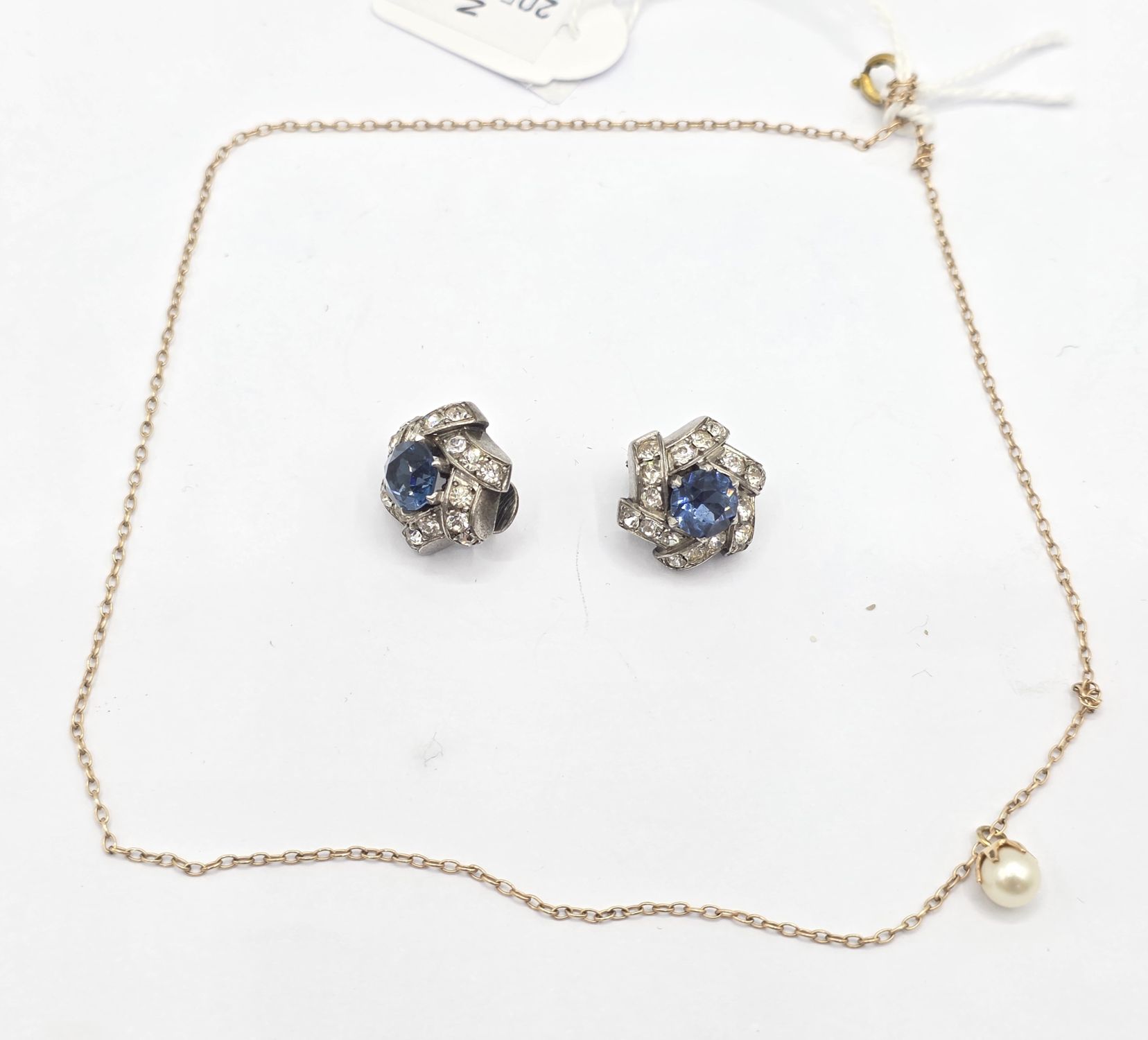 69 · 9CT GOLD PEARL PENDANT AND EARRINGS