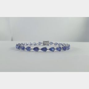 9CT WHITE GOLD BRACELET WITH 10.02CT PEAR SHAPED TANZANITES - 51929/12341