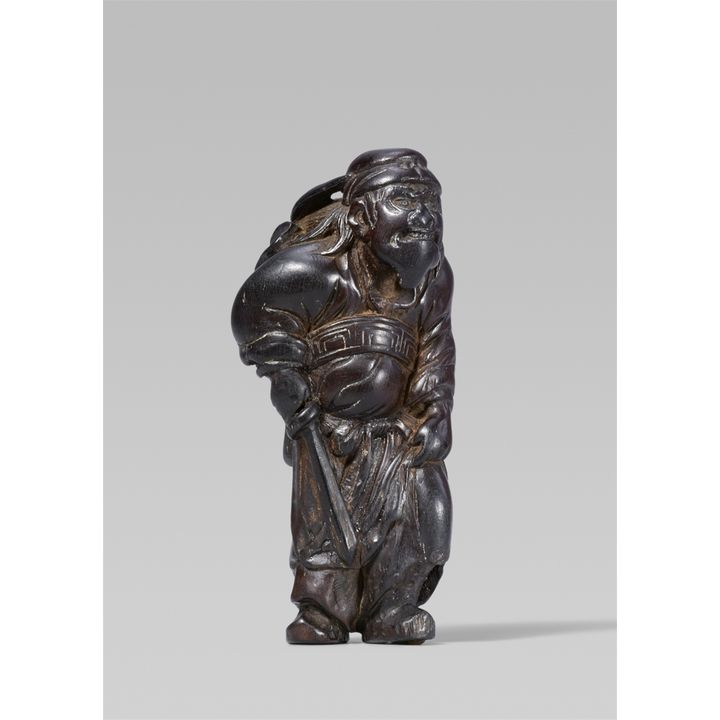 A wood netsuke of Shoki. Early 19th century