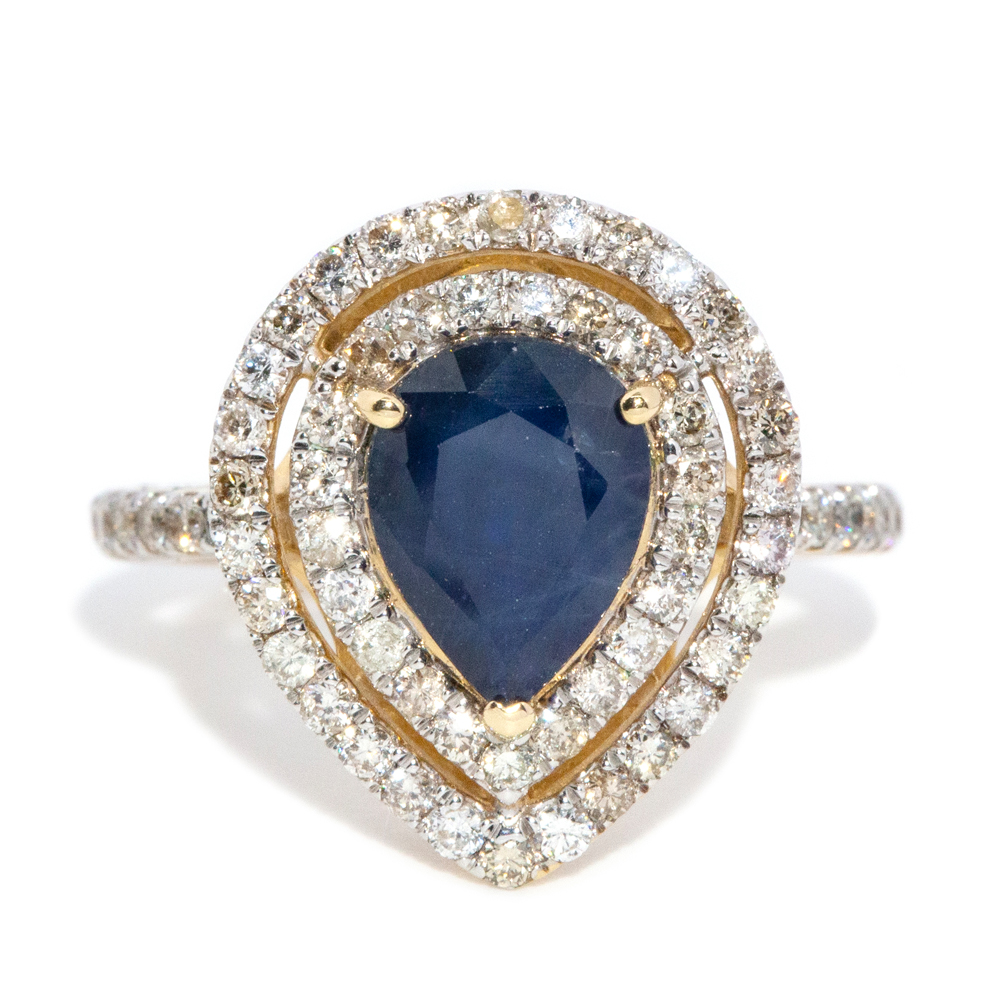 25 · 2.02 Carat Pear-Cut Sapphire and Double Diamond Halo Ring