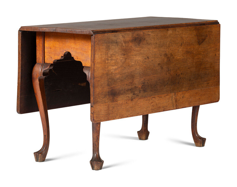 A Queen Anne Carved Walnut Drop-Leaf Dining Table