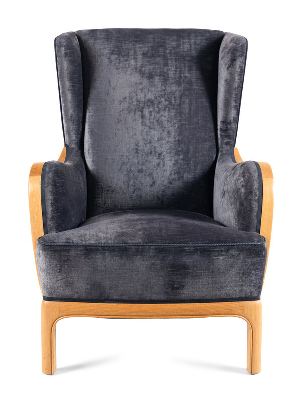 A Contemporary Velvet Upholstered Wing Chair