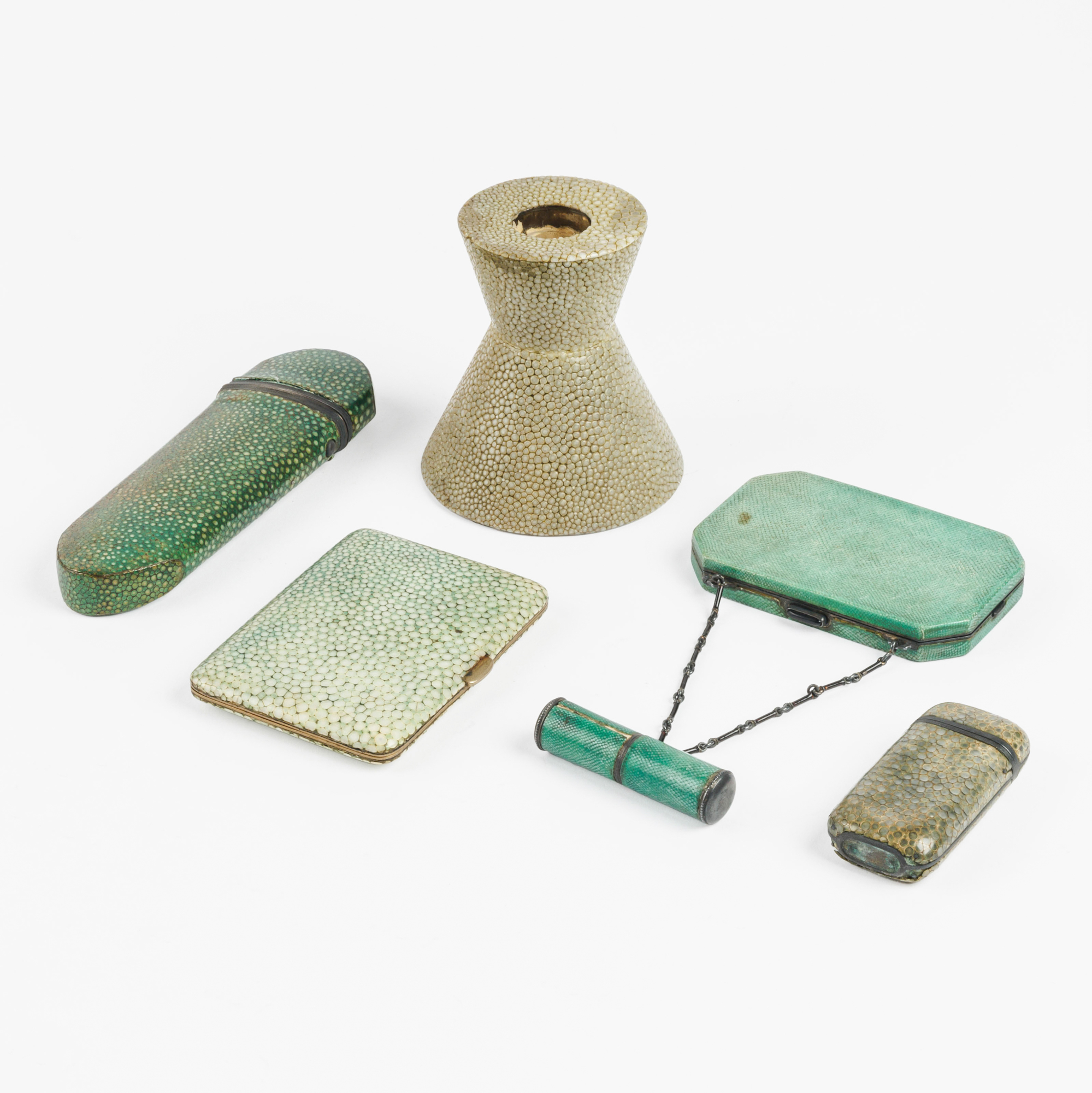 Five shagreen veneered art deco piecesn and one in viper leather. 1. Diabolo candleholder – kavel bij Bernaerts, Antwerp