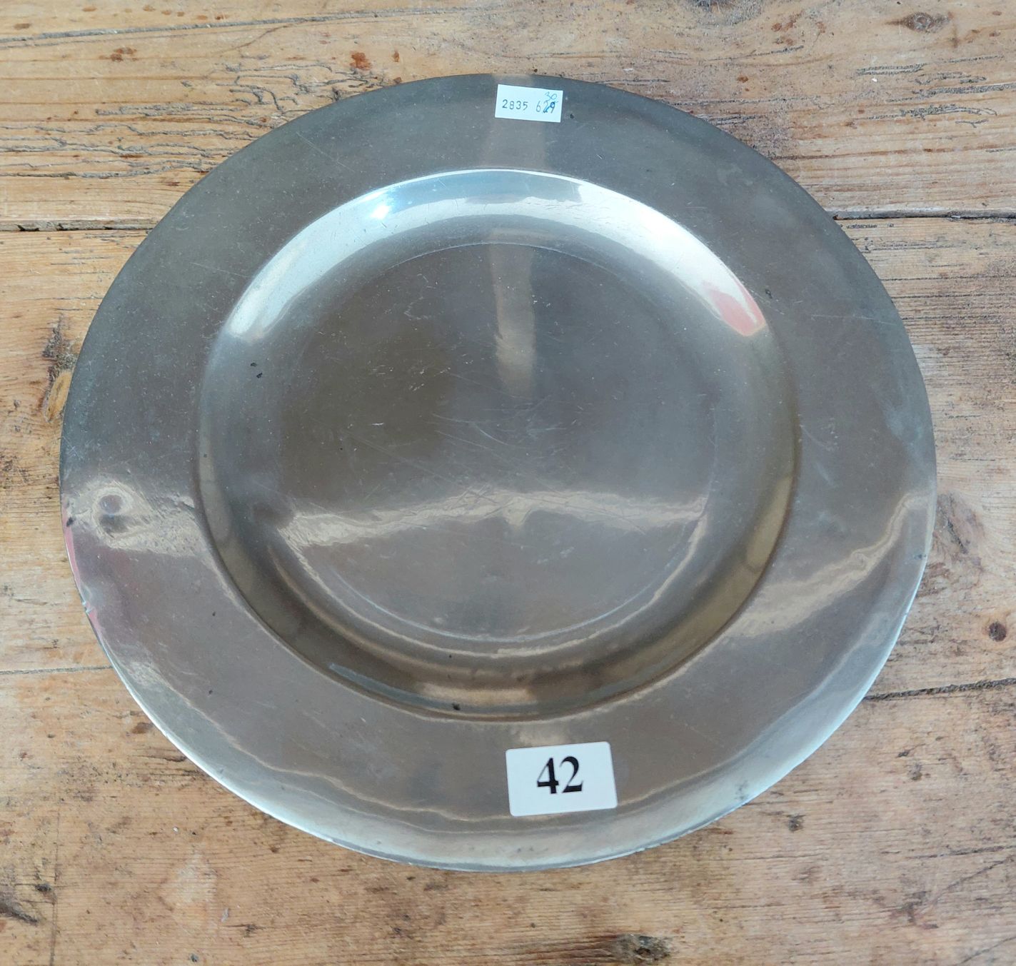 A Pewter Plain-Rimmed Plate