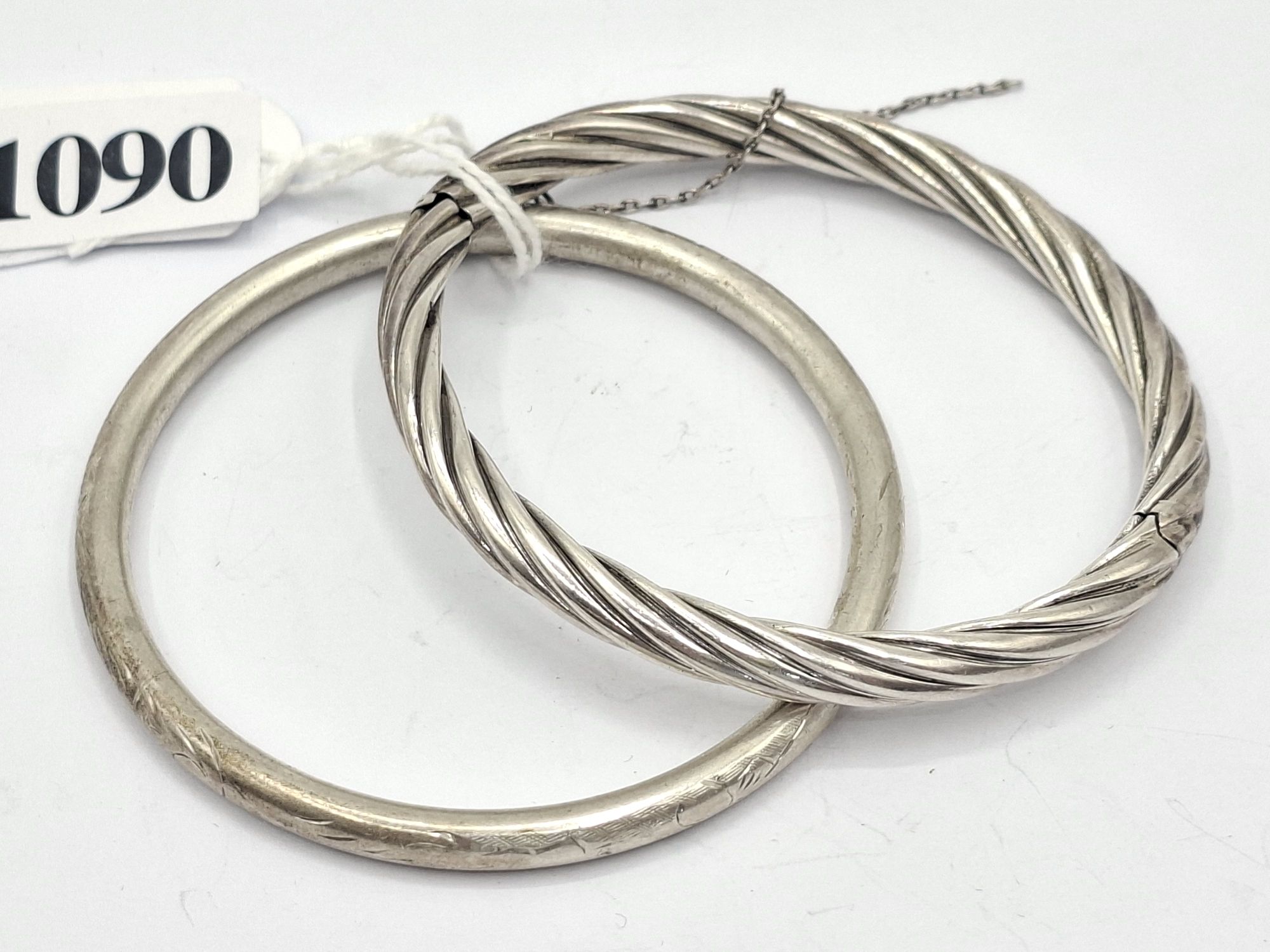1090 · TWO SILVER BANGLES