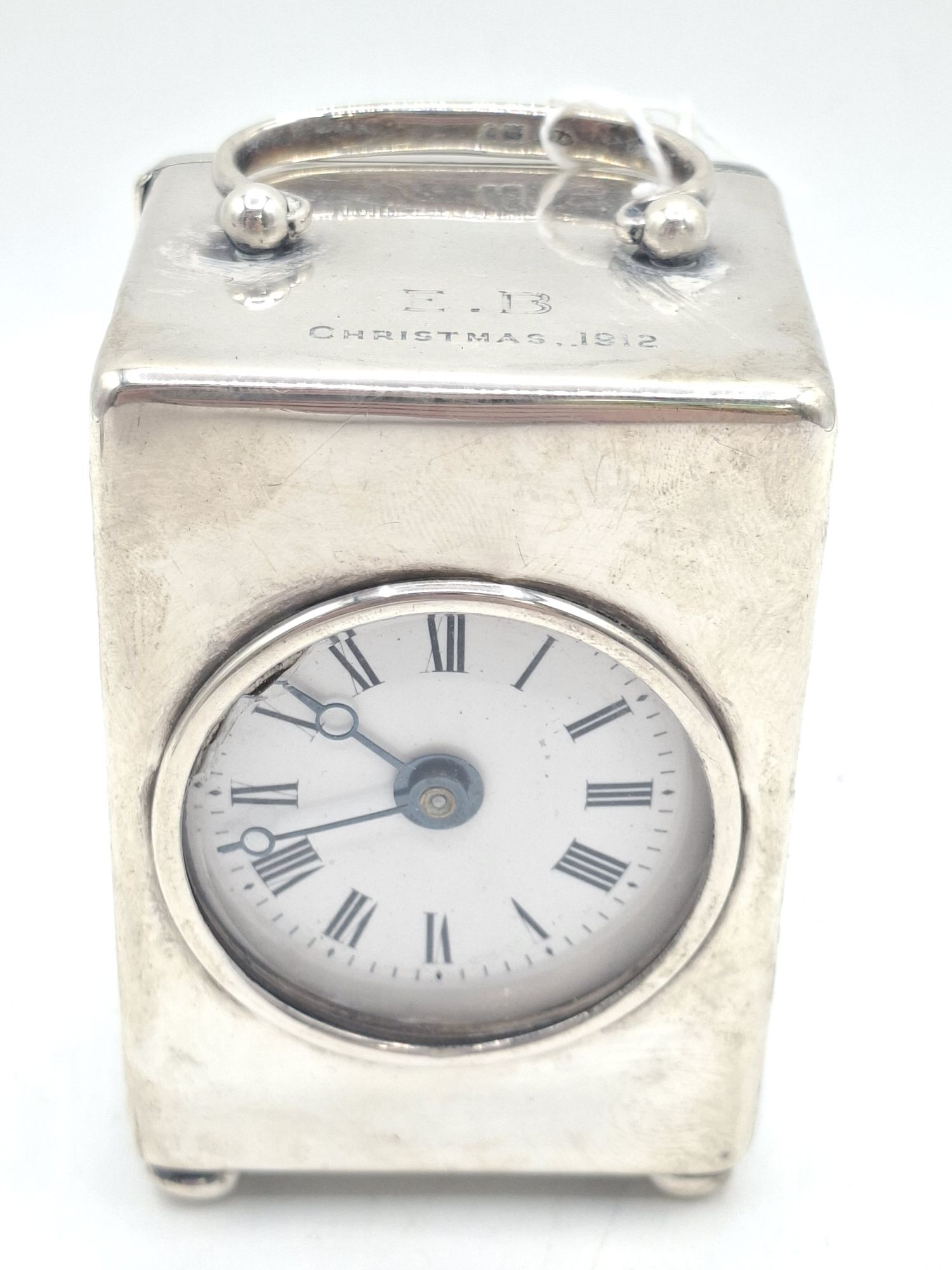 221 · EDWARDIAN SILVER CASED BEDROOM CLOCK