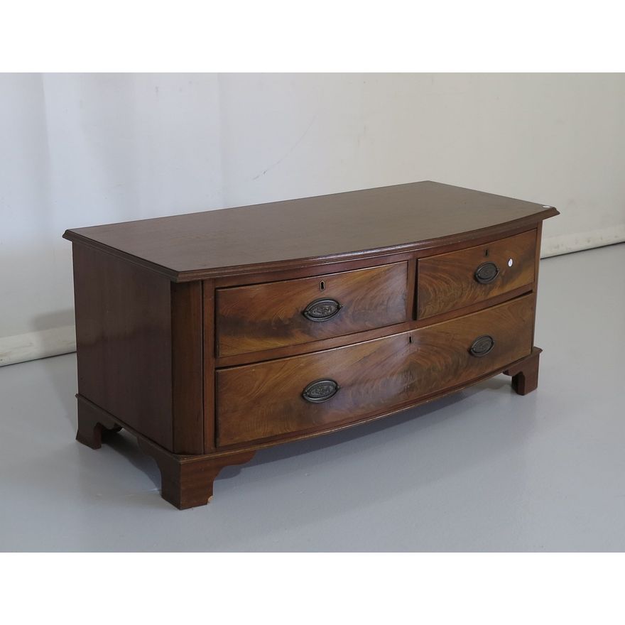 LOW MAHOGANY BOW-FRONTED CHEST OF DRAWERS