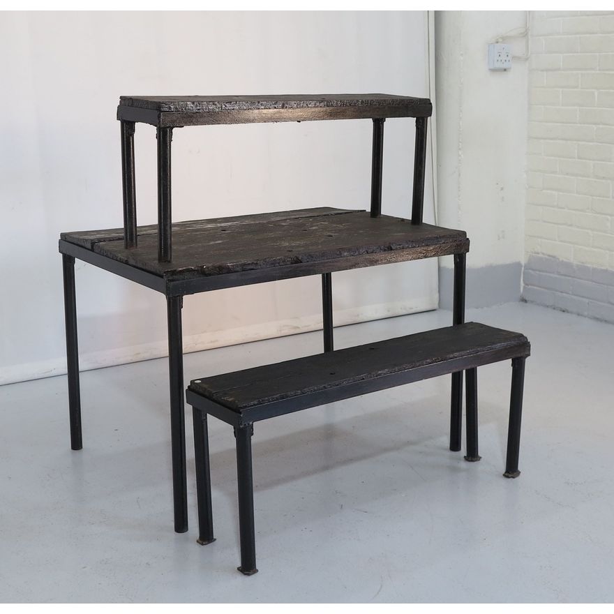 RUSTIC STEEL BASE GARDEN TABLE AND PAIR OF BENCHES