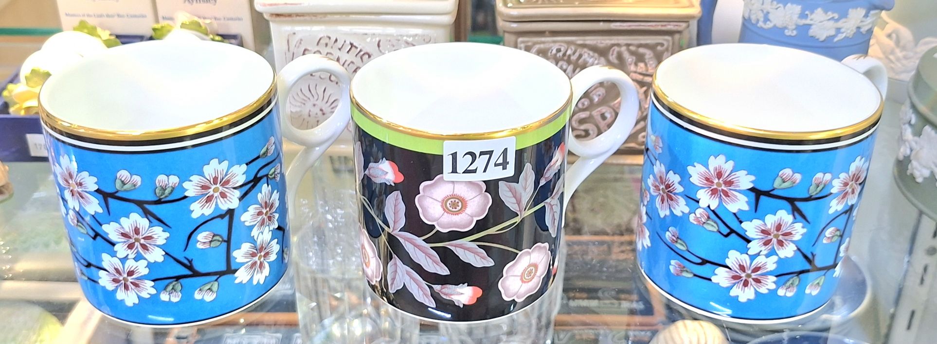 1274 · THREE WEDGWOOD COFFEE CUPS