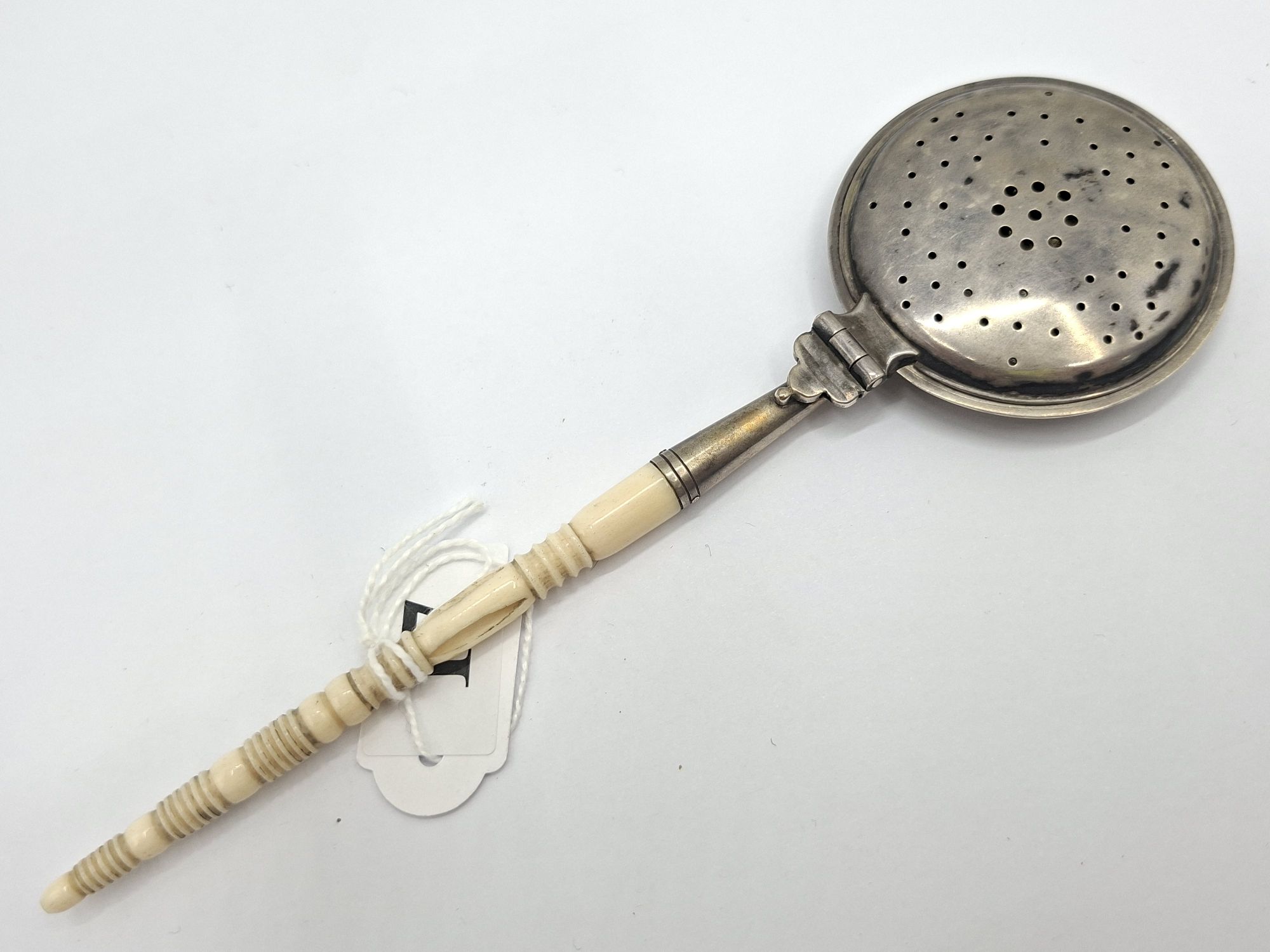 17 · ANTIQUE SILVER TEA INFUSER
