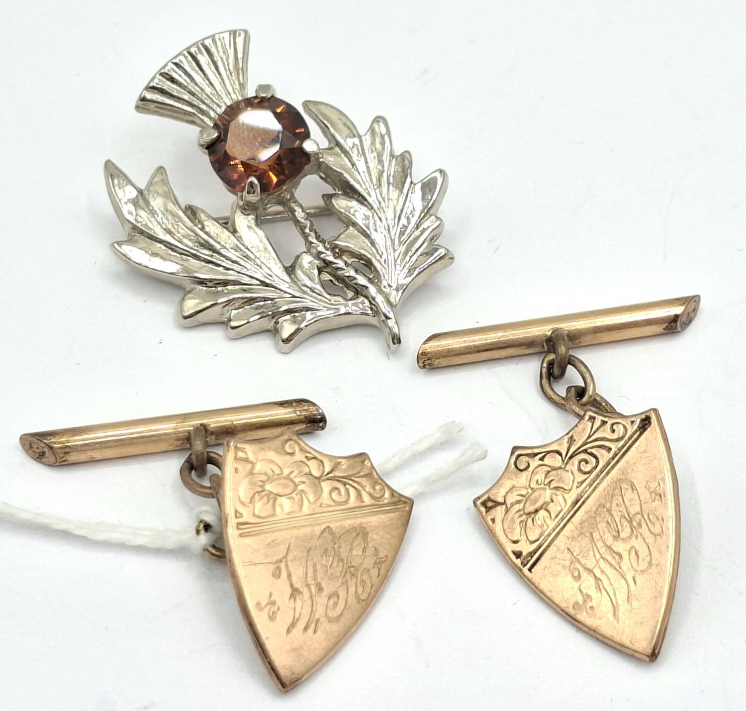 1069 · SHIELD SHAPE CUFFLINKS AND SCOTTISH BROOCH