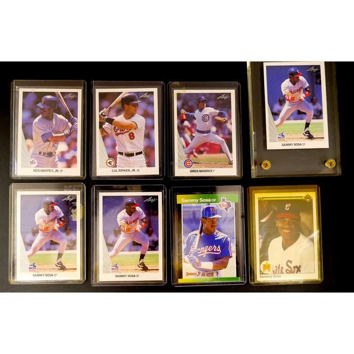 8pc 1980 and 1990's Baseball Cards- Includes Sammy Sosa (Leaf, Upper Deck, & Donruss), Ken Griffey, Cal Ripken Jr, and Greg Maddux.