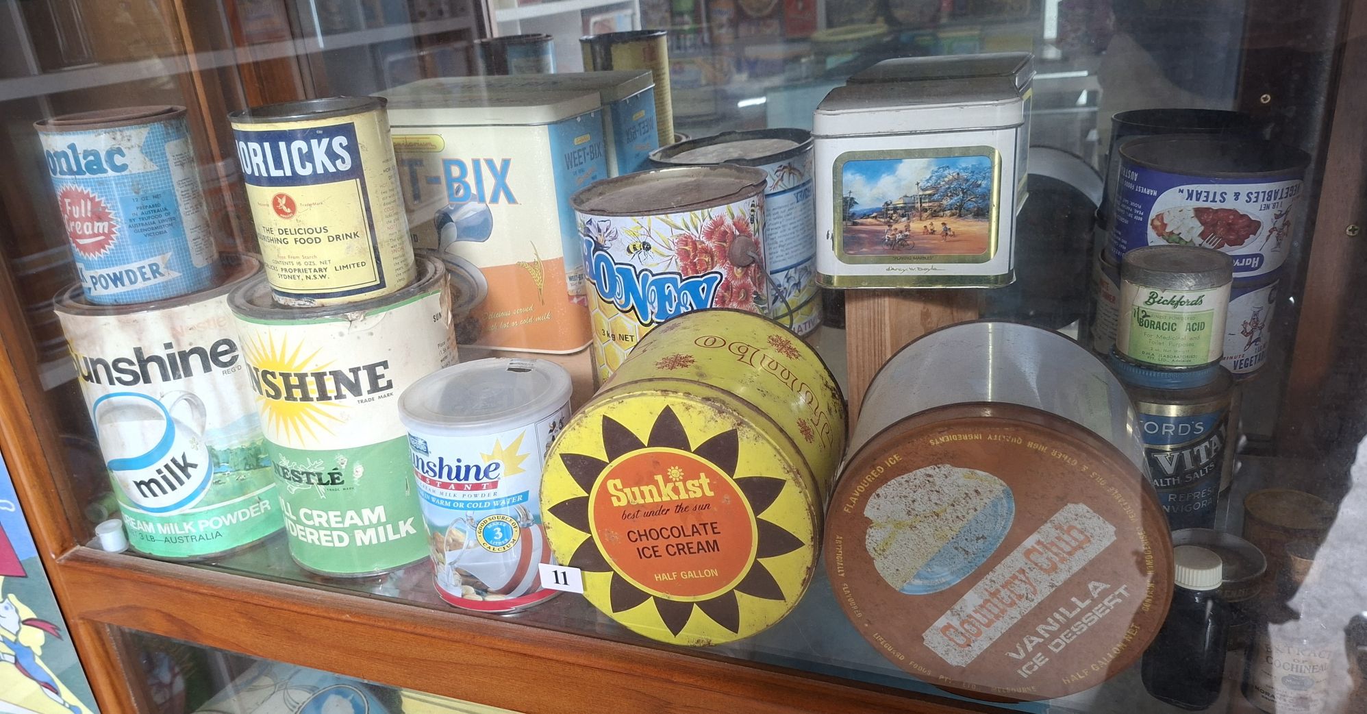 11 · ASSORTED TINS
