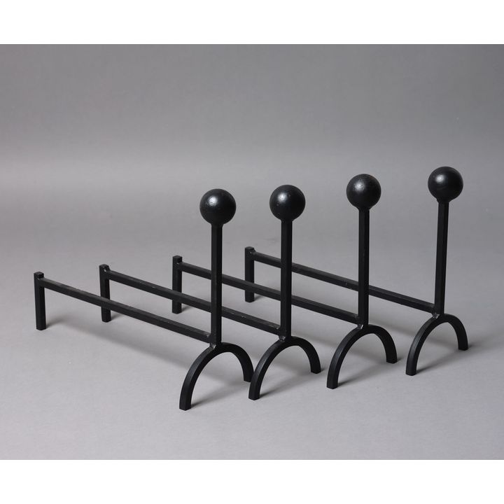 Two pairs of metal fire dogs