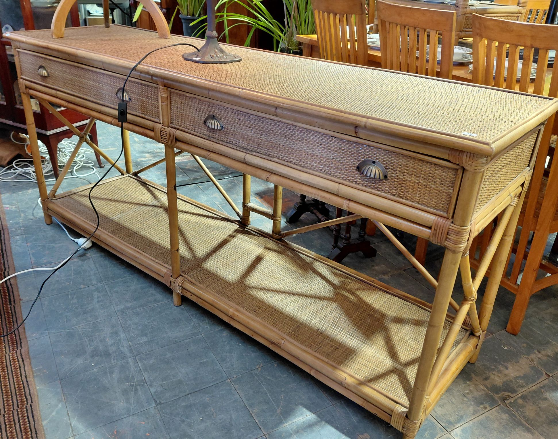 74 · A WOVEN RATTAN HALLWAY TABLE