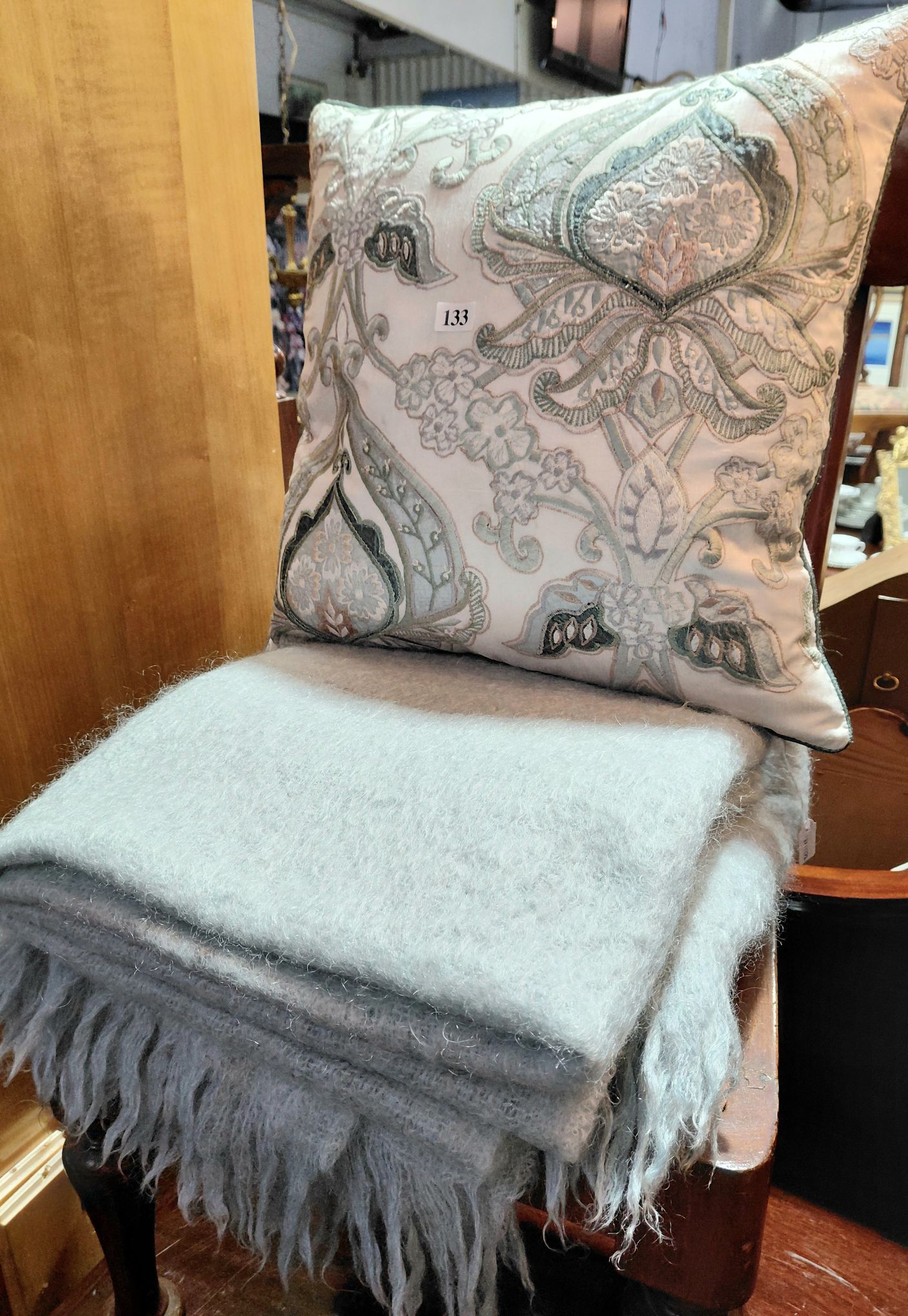 133 · THROW RUG AND CUSHION