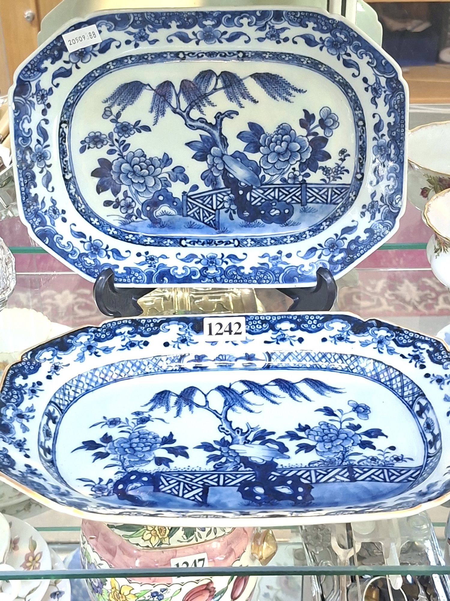 Graduated Pair Of Blue And White Plates