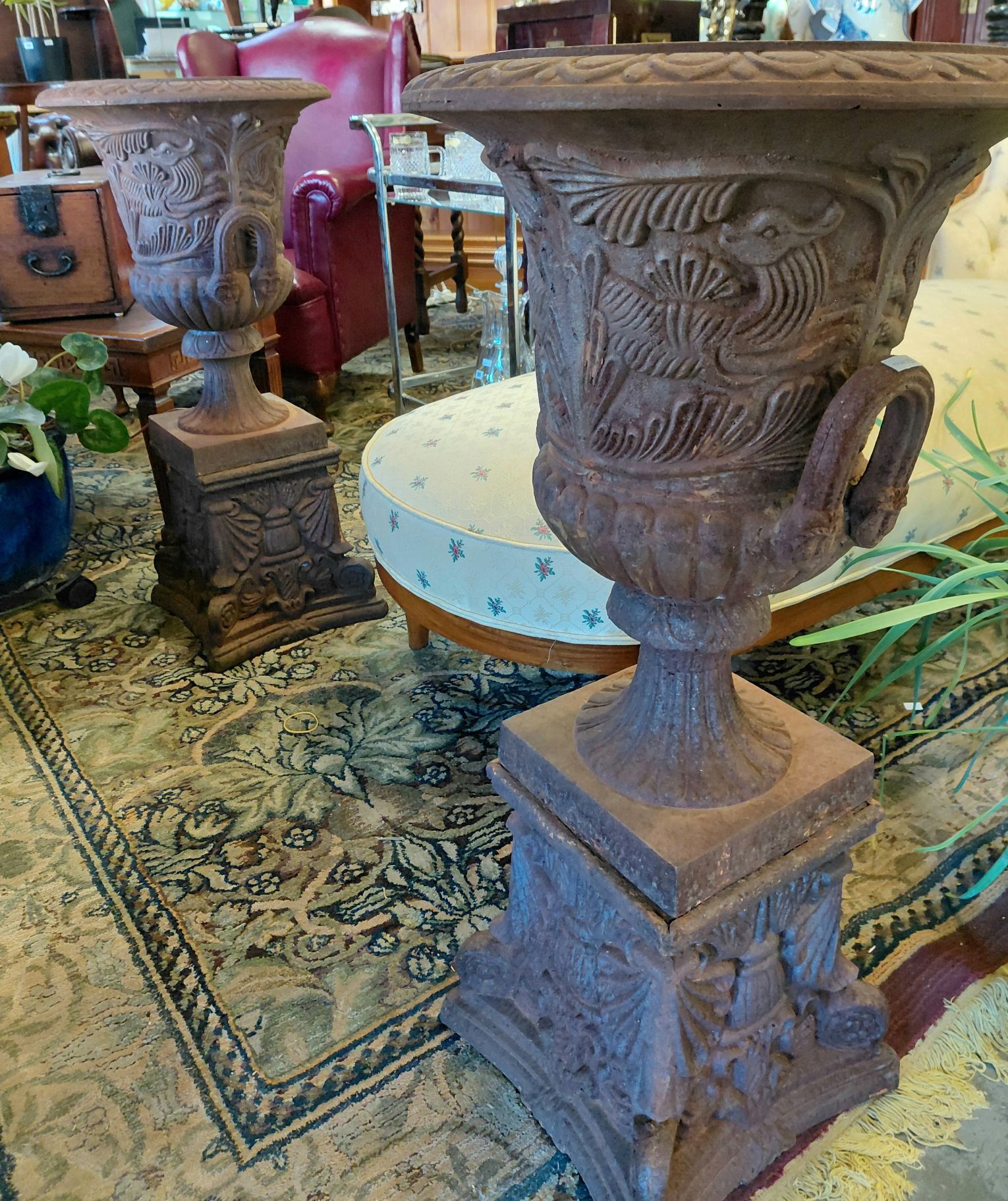69 · CAST IRON URNS ON STANDS