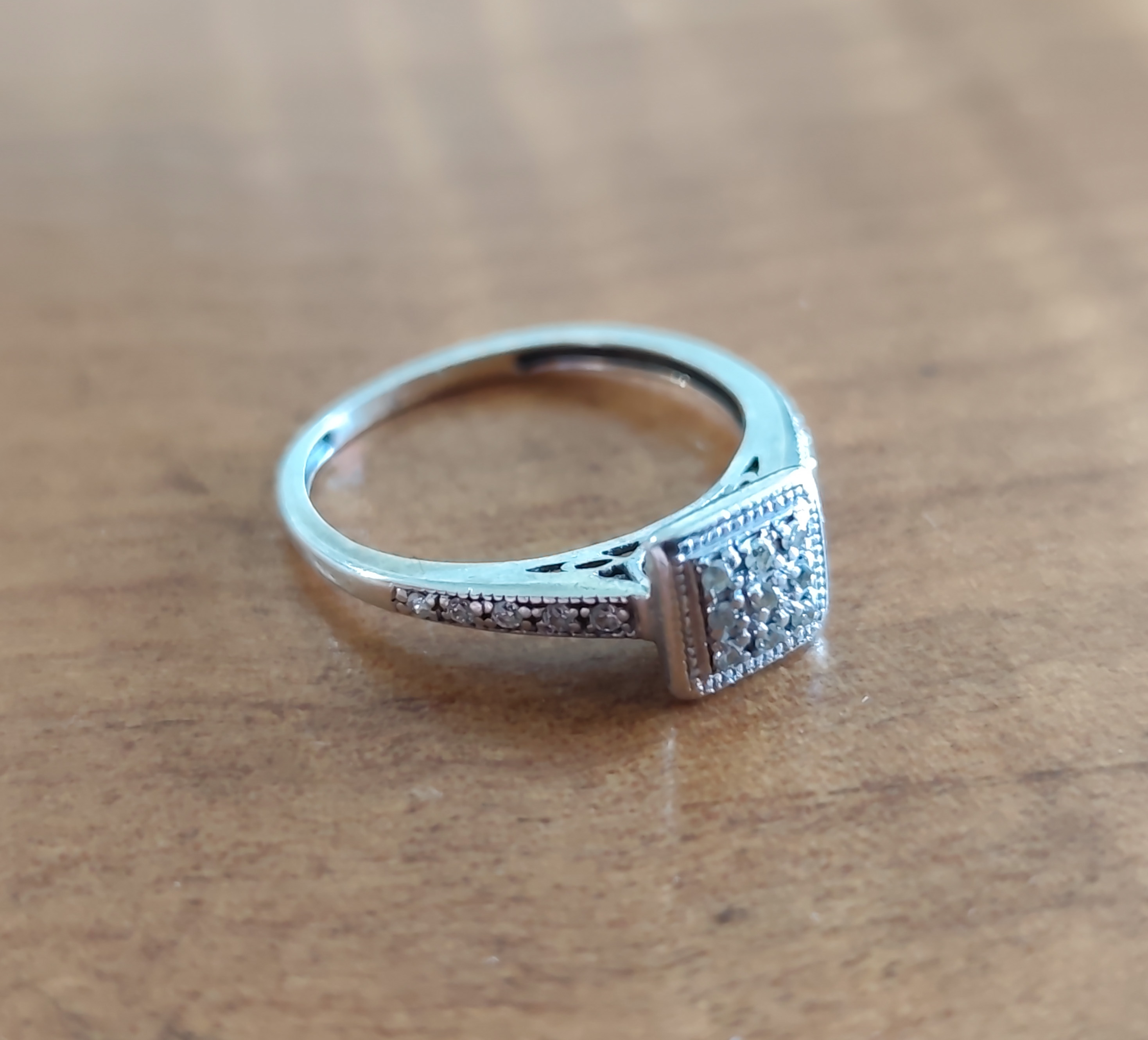 White Gold Ring with Clear Stones — sold at auction in New Zealand for $170