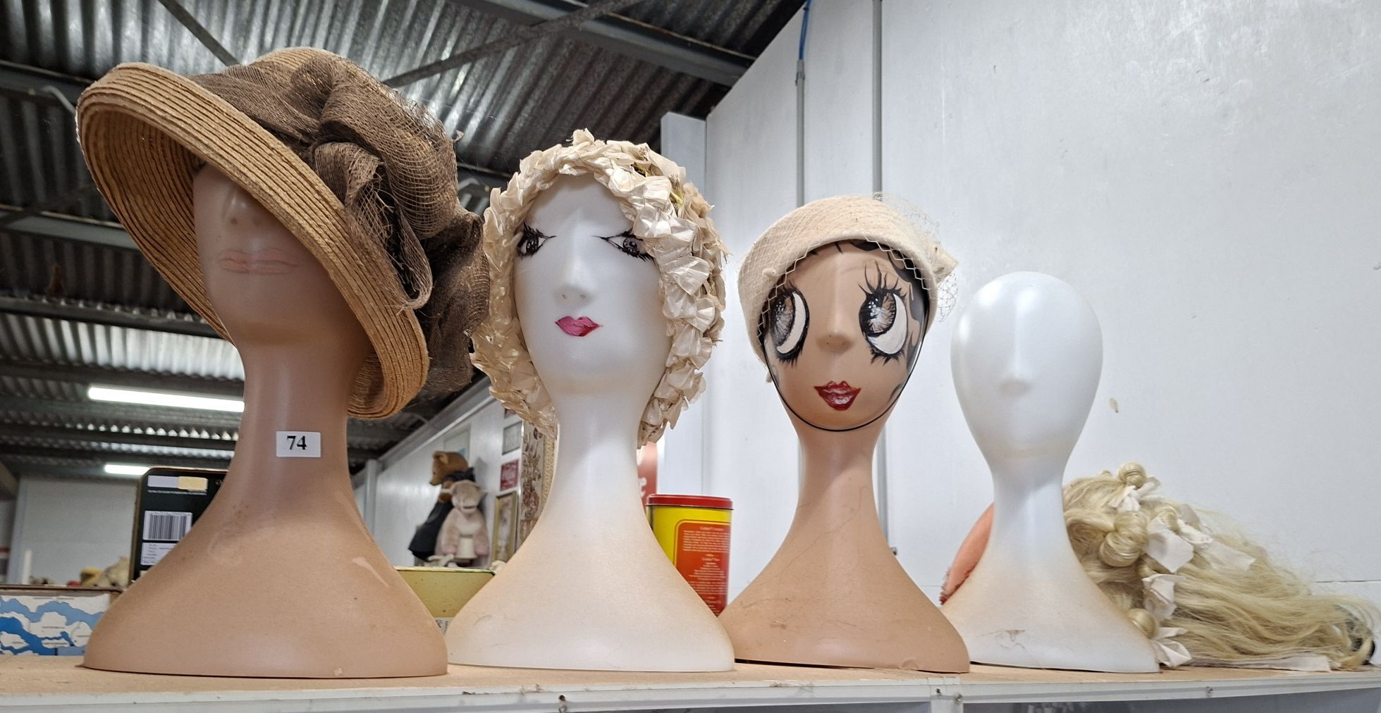 74 · 4 HAT MANNEQUINS
