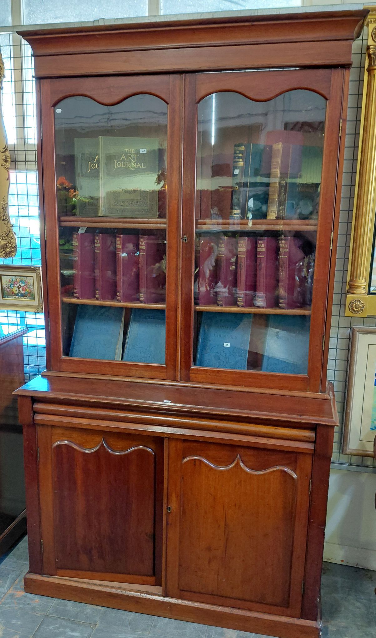 22 · 19TH CENTURY BOOKCASE