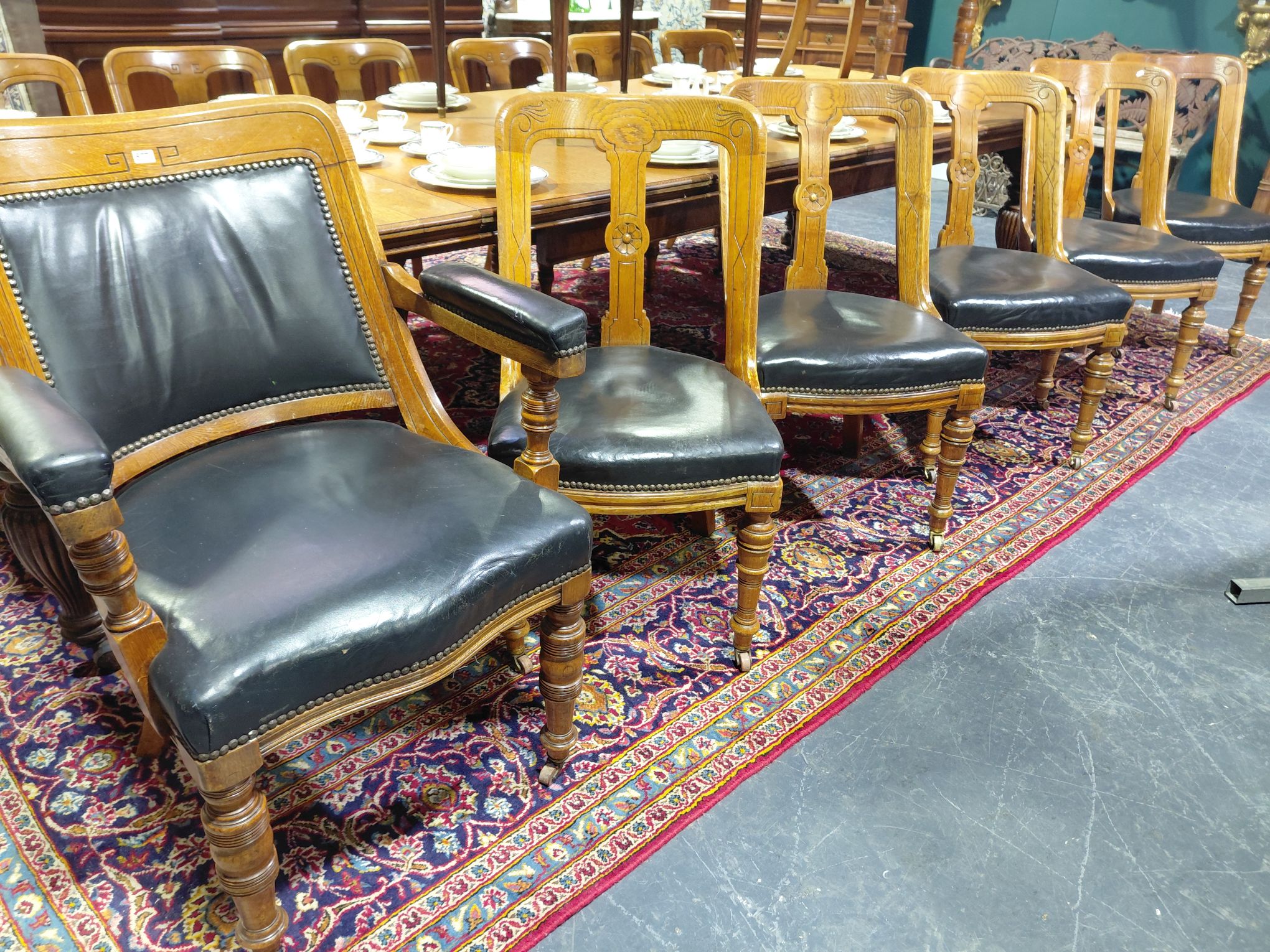 577 · MAGNIFICENT HARLEQUIN SUITE OF 14 DINING CHAIRS
