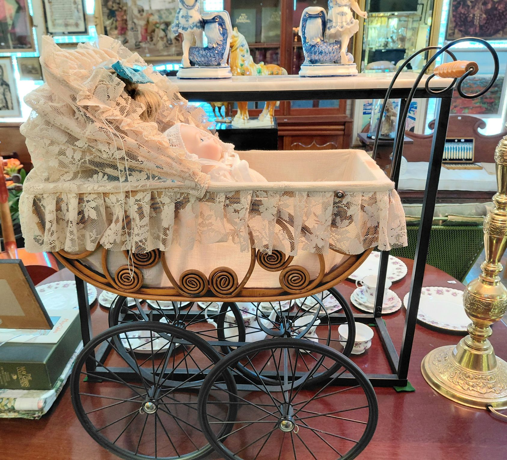 249 · CHILDS PRAM AND DOLLS